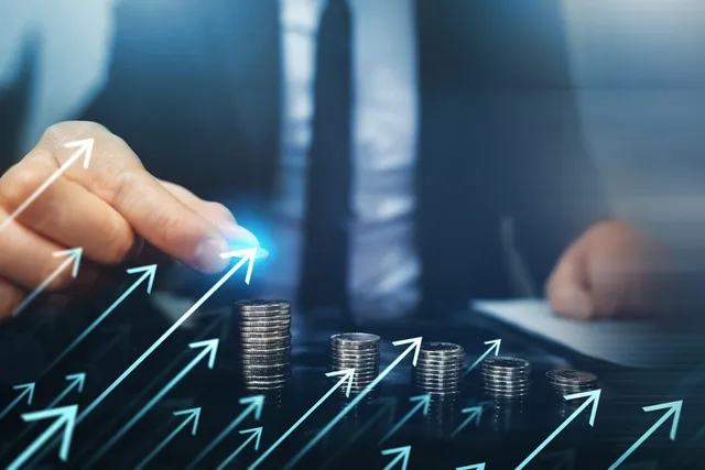 Investor with pile of coins